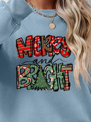 Misty Blue crewneck sweatshirt with Merry and Bright Christmas graphic and festive patterns.