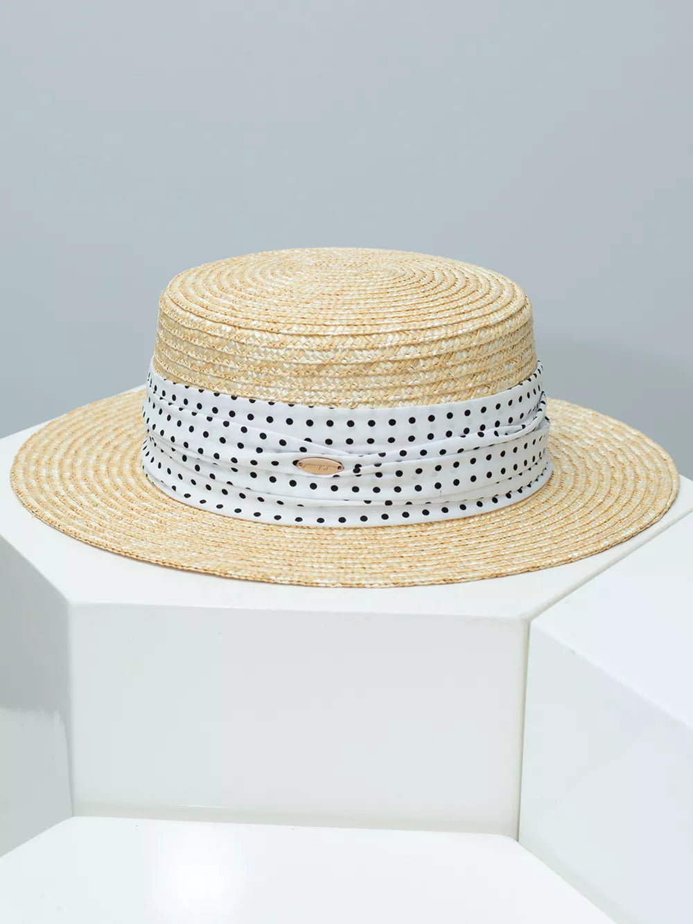 Wheat straw boater hat with ruched polka dot ribbon detail