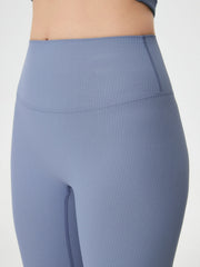 Light blue ribbed high-waist leggings with a sculpted fit.