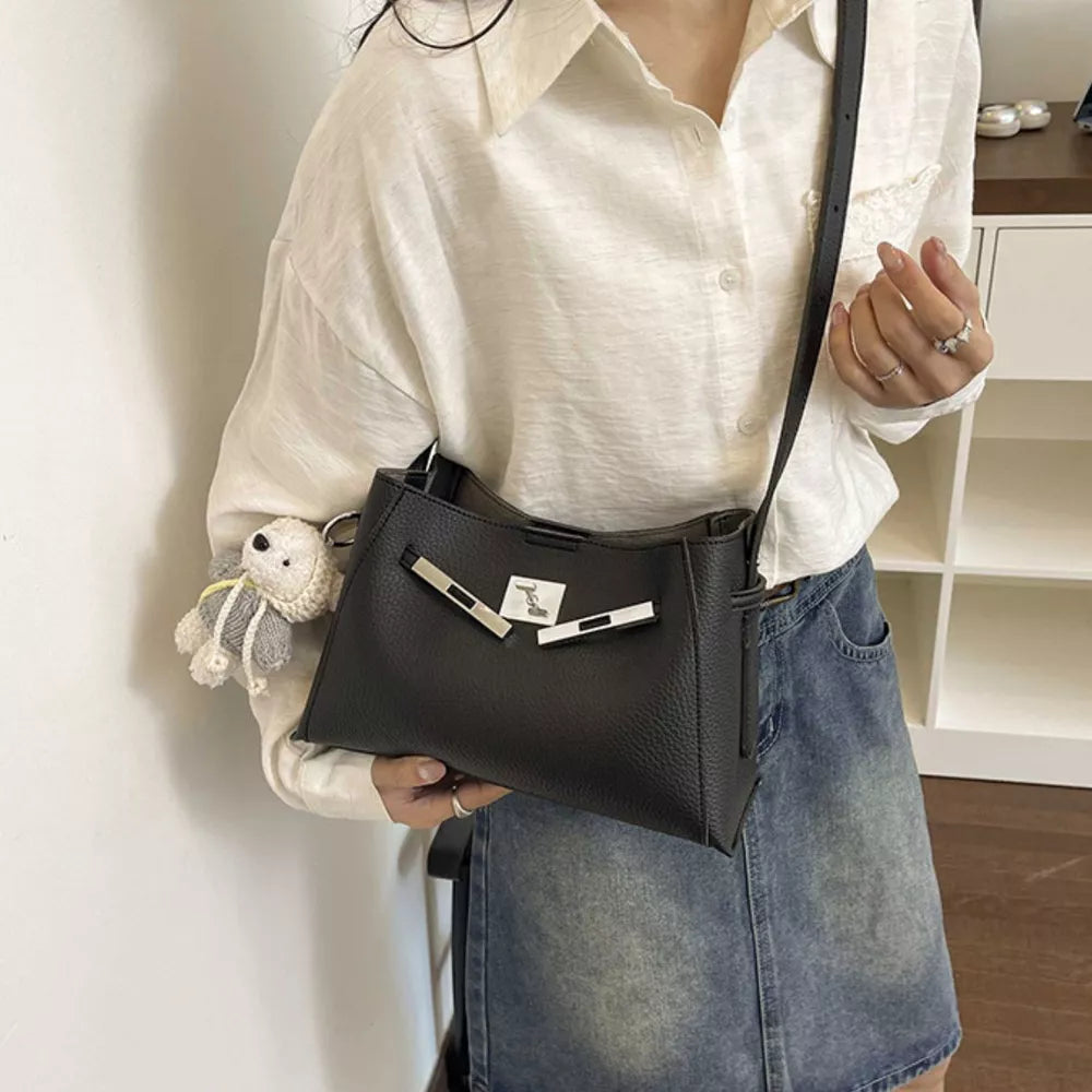 Lock Detail Crossbody Bag in Black, close-up detail