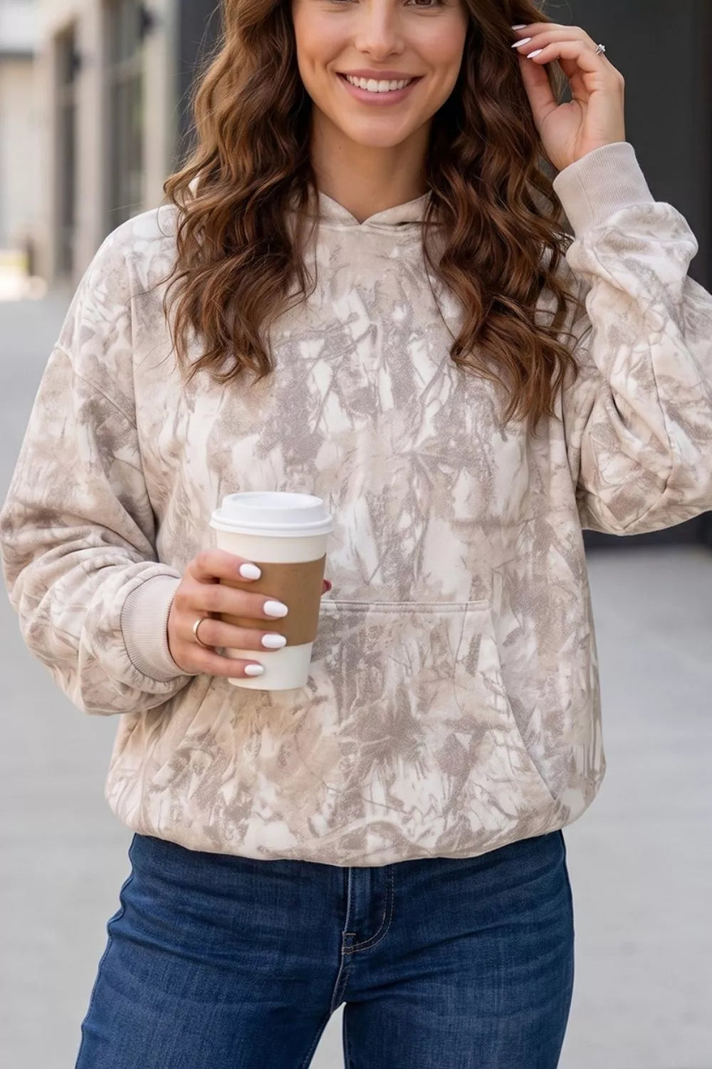 cream pullover hoodie with abstract and hooded