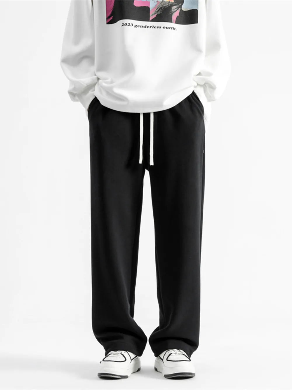 Black relaxed fit drawstring wide-leg sweatpants with white drawstrings.