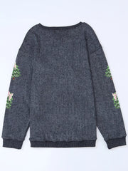 Dark gray ribbed baggy sweatshirt with sequin Christmas trees on sleeves.