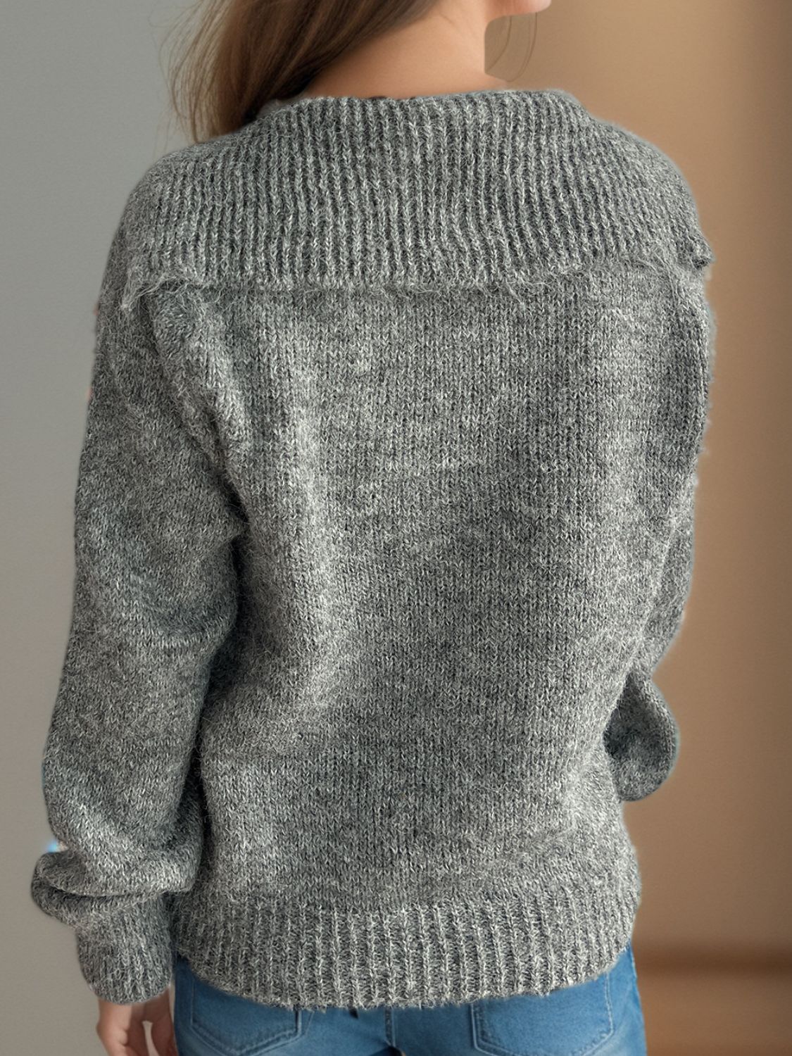 Textured knit sweater in dark gray with a wide ribbed collar and cuffs.