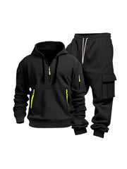 Black half-zip hoodie and cargo sweatpants set with neon yellow zipper accents.