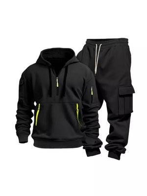 Black half-zip hoodie and cargo sweatpants set with neon yellow zipper accents.