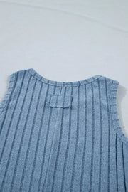 Textured blue mineral wash tank top with vertical ribbing and a bow detail at the back neckline.