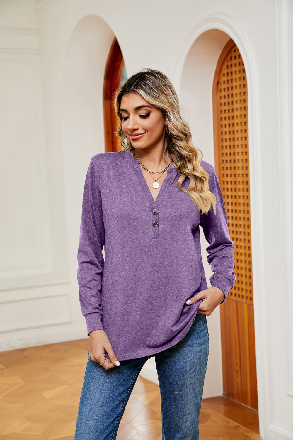 Henley-inspired long sleeve top in heathered purple with button detail and v-neck