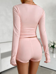 Blush pink Henley crop top and fitted short set, long sleeve top with button detail.