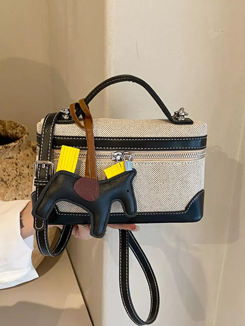 Top Handle Detachable Strap Mini Handbag in Black, close-up detail