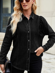Black denim blouse with ruffled puff sleeves and button front.