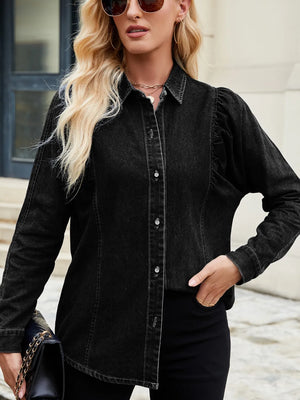 Black denim blouse with ruffled puff sleeves and button front.