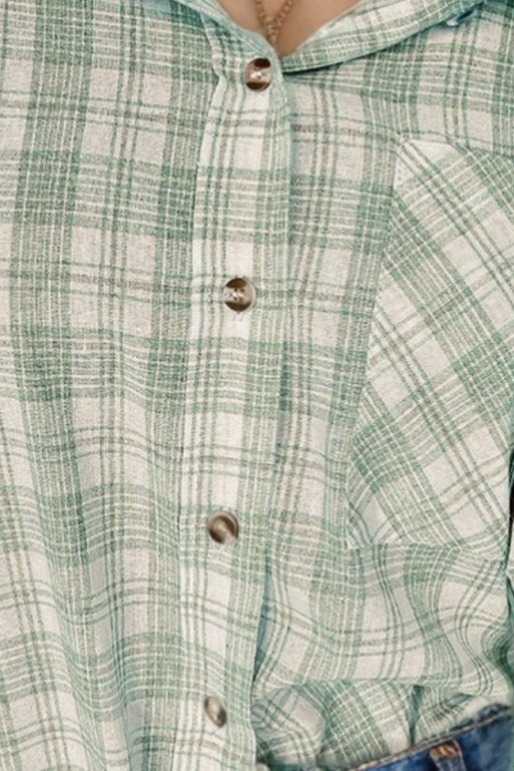 Plaid hooded shirt jacket in Gum Leaf green cotton with button front and chest pocket.
