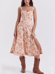 Floral midi dress with side slit, sweetheart neckline, and corset bodice.
