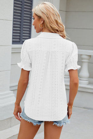 White eyelet polo blouse with short ruffled sleeves and button detail