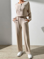 Tan ribbed henley lounge set with button detail and wide-leg pants.