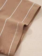 Brown striped t-shirt dress with white pinstripes and a rolled sleeve detail.