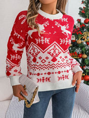 Red acrylic knit sweater with white reindeer and snowflake Fair Isle pattern.