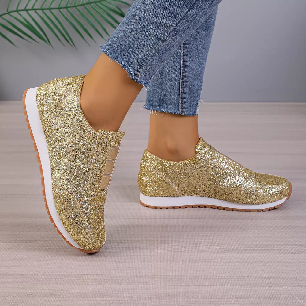 Gold glitter slip-on flats with round toe and white sole