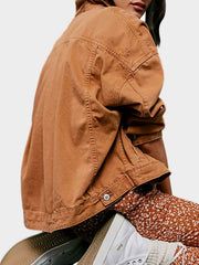 Oversized caramel washed cotton utility jacket with button details and a relaxed fit.