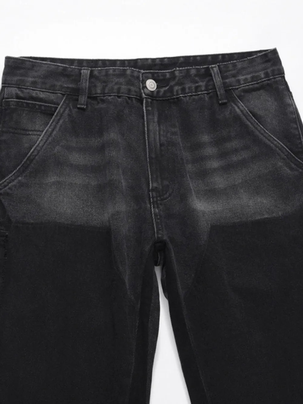 Black two-tone carpenter jeans with straight leg fit and visible stitching details.
