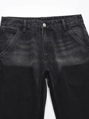 Black two-tone carpenter jeans with straight leg fit and visible stitching details.
