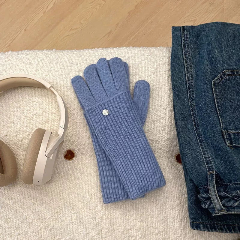 Convertible ribbed knit touchscreen gloves in blue with a silver button detail.