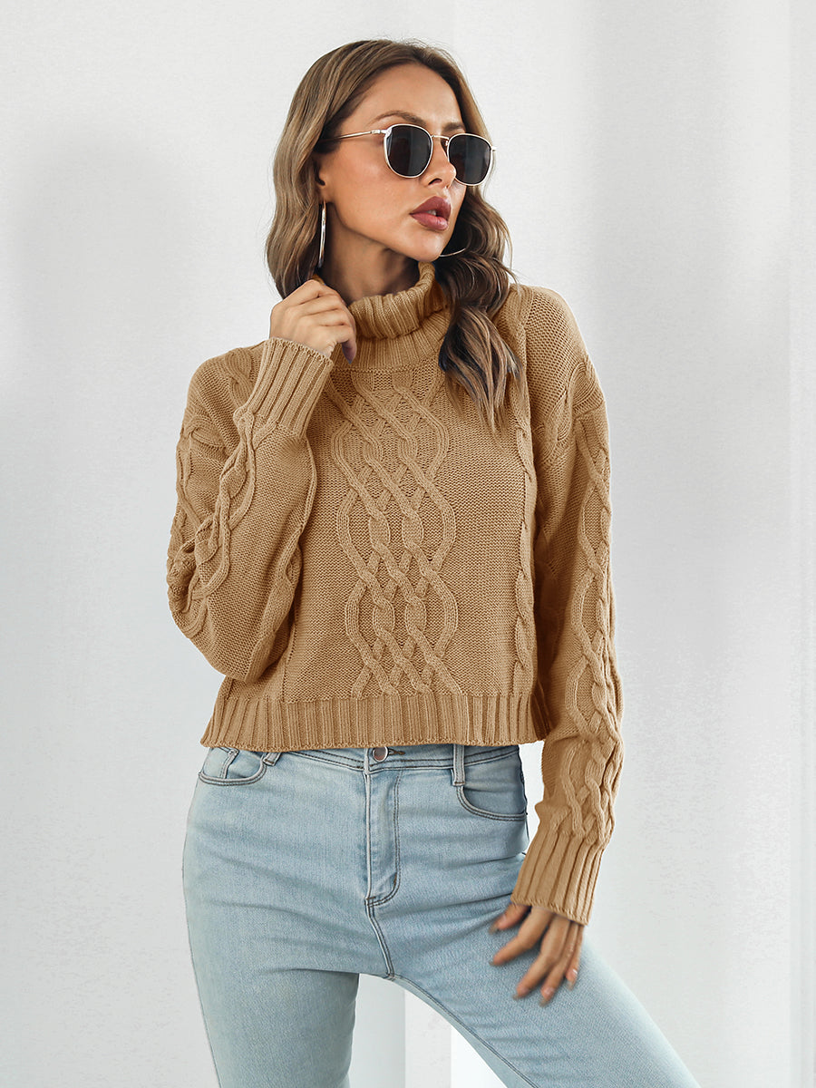 Caramel cable knit cropped turtleneck sweater with chunky knit details.