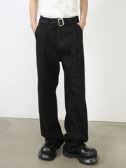 Black denim wide-leg trousers with a matching belt and silver buckle.