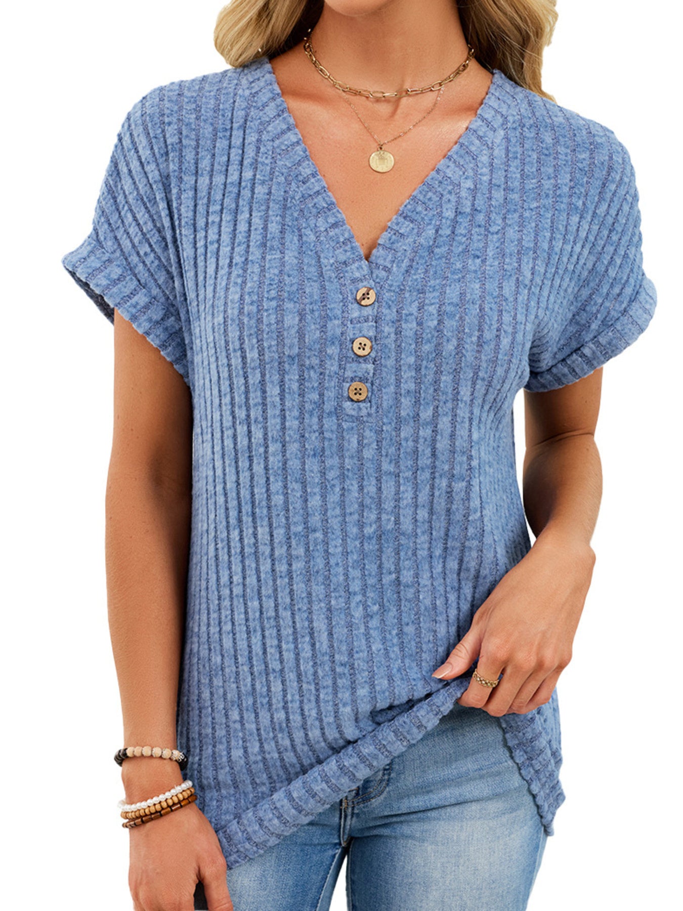Light blue ribbed knit v-neck t-shirt with short sleeves and three wooden buttons.