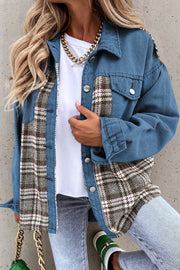 Light blue denim trucker jacket with plaid panels and button front.