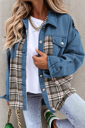 Light blue denim trucker jacket with plaid panels and button front.
