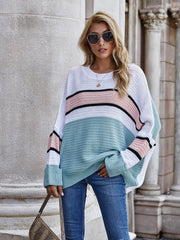 Colorblock slouchy knit tunic with stripes in white, pink, black, and mint green acrylic.