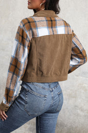 Brown corduroy jacket with plaid patchwork sleeves and back panel.