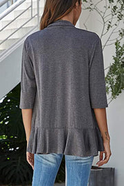 Dark Gray cardigan with 3/4 sleeves and asymmetrical ruffle hem detail.