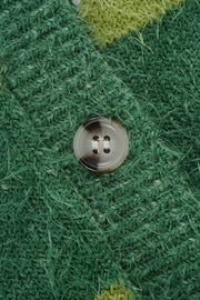 Green textured stripe button-up cardigan with a fuzzy knit and marbled button detail.