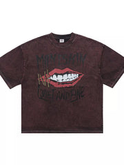 Burgundy crew neck t-shirt with edgy lip graphic and text.