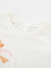White cotton baby tee with playful graphic detail and crew neck.