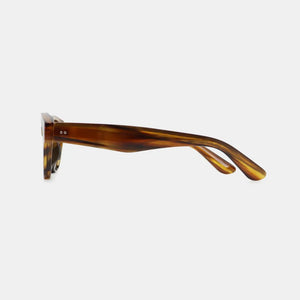Tortoiseshell oval acetate sunglasses with brown tortoise pattern.