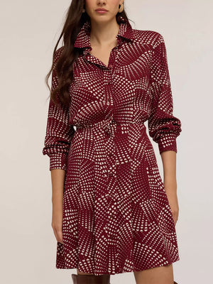 Burgundy heart dot print mini shirt dress with button front and tie waist.