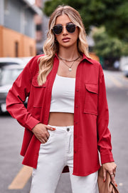Oversized utility shirt in deep red with two chest pockets and button front.