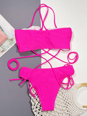 Hot pink ruched strappy bikini set with lace-up detailing.