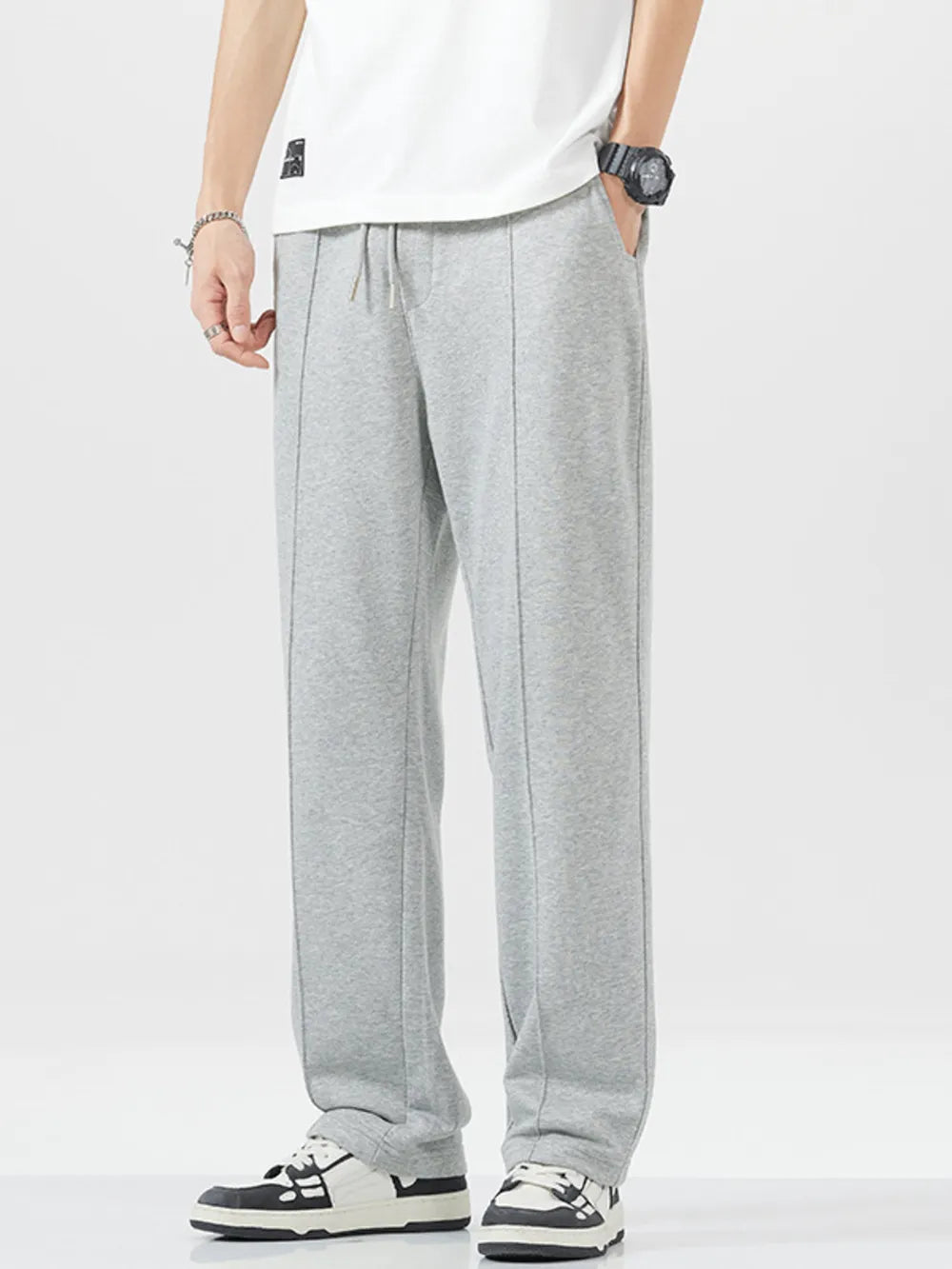 Men's grey heather sweatpants with drawstring and seam detail