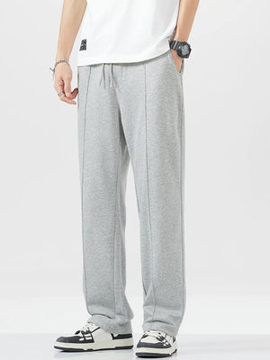 Men's grey heather sweatpants with drawstring and seam detail