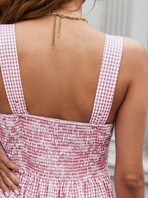 Smocked gingham peplum tank top in deep red with square neckline and adjustable straps.