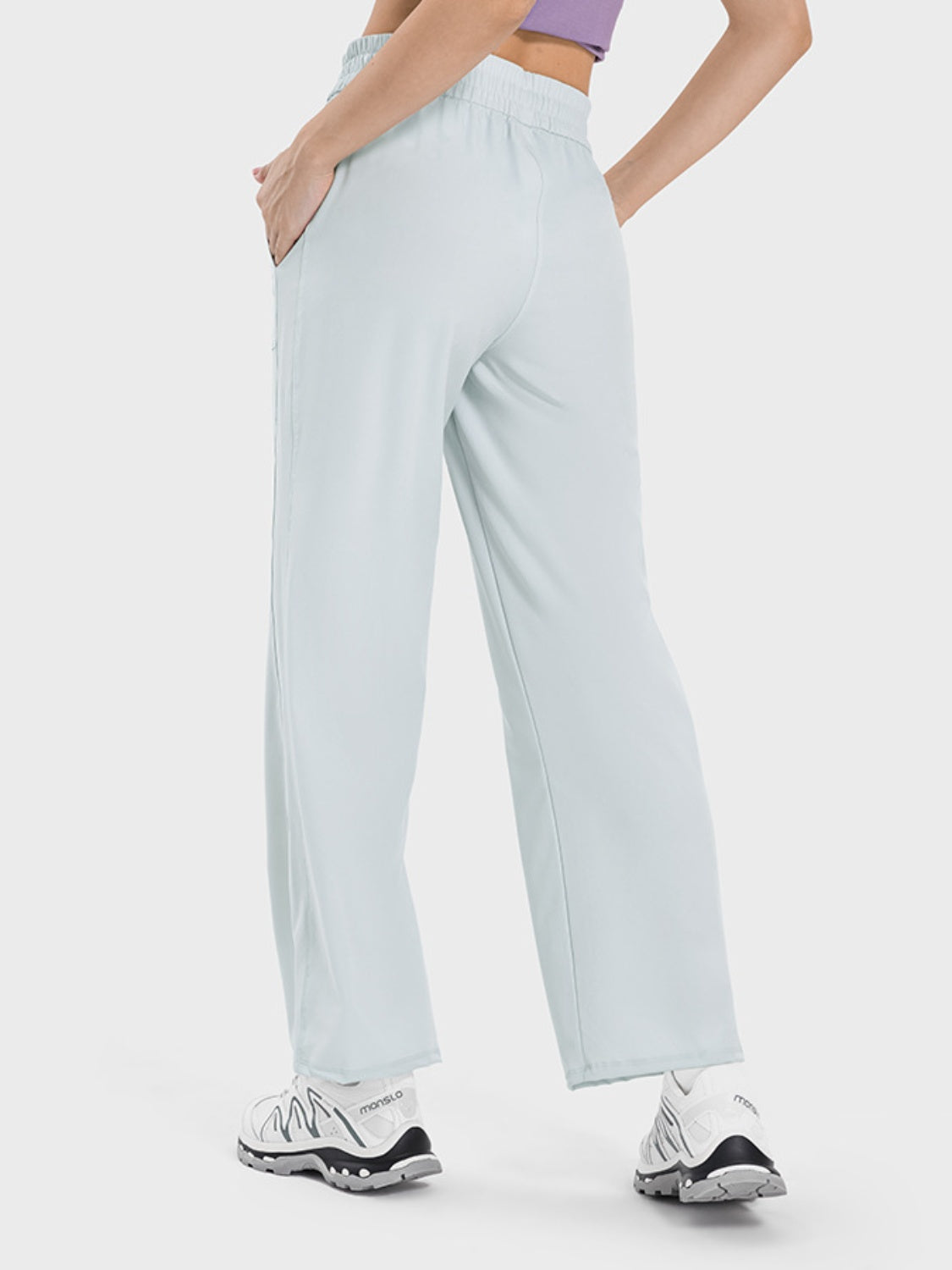 Relaxed fit palazzo pants in Cloudy Blue with drawstring waist and pockets.