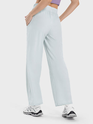 Relaxed fit palazzo pants in Cloudy Blue with drawstring waist and pockets.