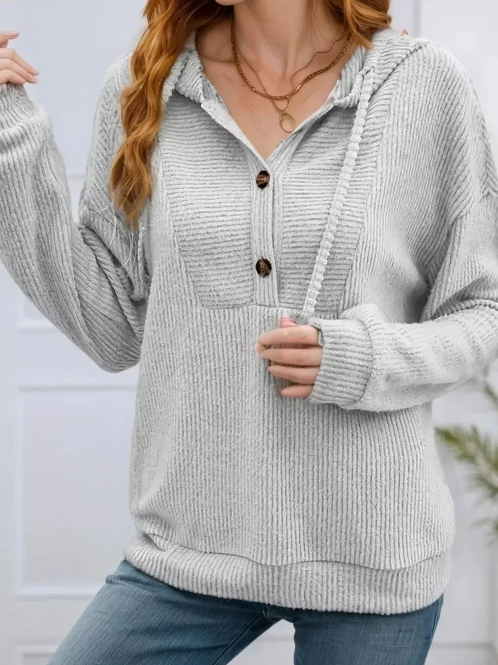 Light Gray button-front drawstring hoodie with textured fabric and a relaxed fit.