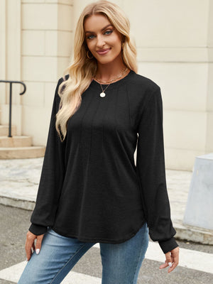 Black crew neck long sleeve top with vertical seam detail