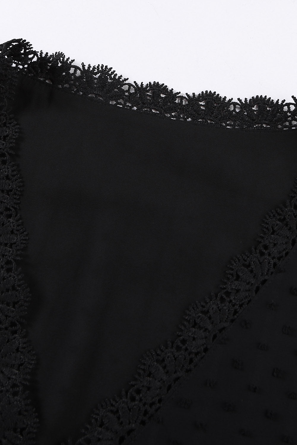 Black textured dot blouse with lace trim neckline detail